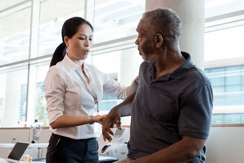Nurse treating patient